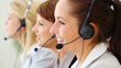 Closeup of friendly female operator smiling while on call