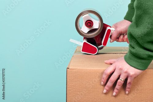 Photo: Packaging a box Packaging a box