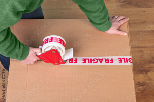 Photo: Packaging a box Packaging a box