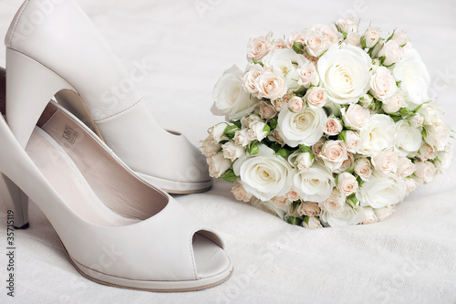 Photo: Wedding bouquet and bride's shoes Wedding bouquet and bride's shoes