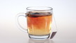 A tea bag in glass cup boiling water. Accelerated