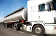 Fuel Tanker truck driving on country-road/motion