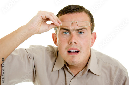 Photo: Funny man in glasses on white background. Funny man in glasses on white background.
