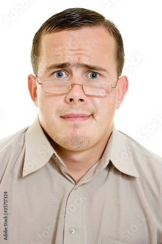 Photo: Funny man in glasses on white background. Funny man in glasses on white background.