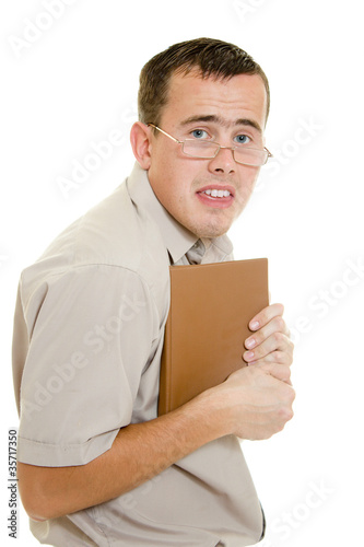 Photo: The man in glasses with a book. The man in glasses with a book.