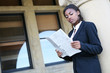 Photo: African Woman Reading Newspaper African Woman Reading Newspaper