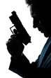 silhouette man portrait with gun