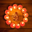 chirstmas candles circle over wood and symbol chirstmas candles circle over wood and symbol