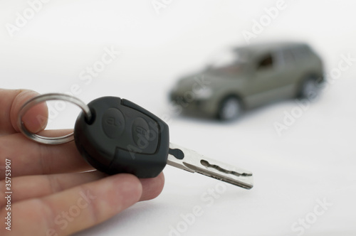 Photo: Keys and a car in the background Keys and a car in the background