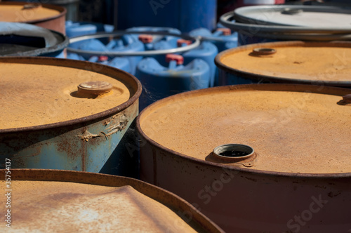 Photo: Old colored barrels for oil products Old colored barrels for oil products