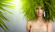 Young  woman and abstract green hair