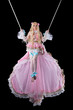 Pretty girl in fary-tale doll costume fly Pretty girl in fary-tale doll costume fly
