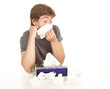 sick young man with flu blowing her nose, series
