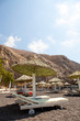 Sunbeds in Perissa, Santorini, Greece