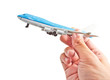 hand holding an air craft model hand holding an air craft model