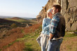 Photo: Young couple on country walk Young couple on country walk