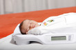 baby boy on weight scale