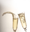 Champagne glasses with golden background