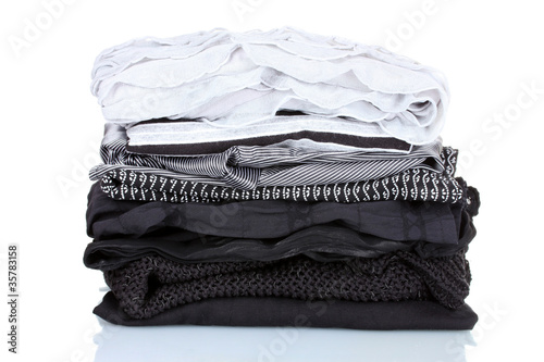 Photo: pile of clothes isolated on white pile of clothes isolated on white
