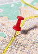 Photo: Red pushpin on a map Red pushpin on a map
