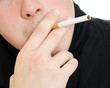 A man with a cigarette in his mouth.