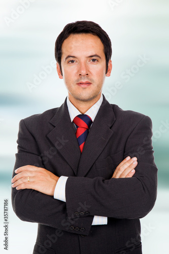 Photo: Close up portrait of an happy young business man Close up portrait of an happy young business man