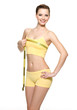 Beautiful smiling woman measuring breast