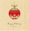 happy holidays; Christmas  ball on wood texture
