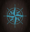 Vector compass rose painting on a wooden wall