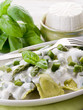 ravioli stuffed with ricotta and basil garnish with cream and as