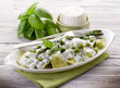 ravioli stuffed with ricotta and basil garnish with cream and as