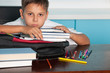 Sad boy at the desk Sad boy at the desk