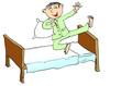 Young boy jumping on the bed