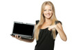 Photo: Pretty business woman pointing at laptop screen Pretty business woman pointing at laptop screen