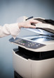 Woman's hand with copier