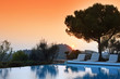 Sunset over pool