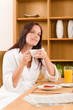 Breakfast at home dreamy woman with coffee Breakfast at home dreamy woman with coffee