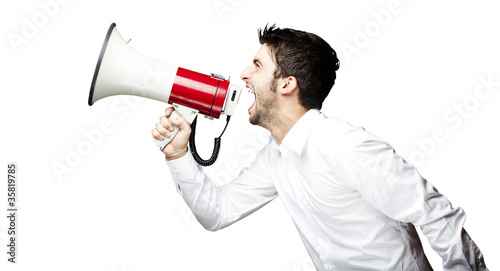 Photo: young man shouting young man shouting