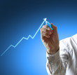Male hand drawing a chart
