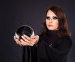 Young woman with crystal ball.