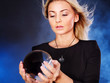 Young woman with crystal ball. Young woman with crystal ball.