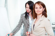 Businesswomen writing