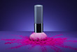 makeup brush and face powder scattered