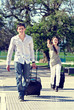men and women hurry with bag men and women hurry with bag