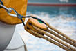 Old wooden block with rope Old wooden block with rope