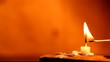 Close up of Candle with red background Close up of Candle with red background