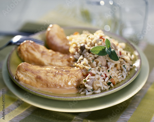 Foto: Quenelles de brochet sauce Nantua et riz Quenelles de brochet sauce Nantua et riz