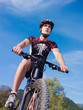 Photo: young man training on mountain bike young man training on mountain bike