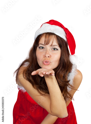 Photo: Air-kissing girl in christmas costume Air-kissing girl in christmas costume