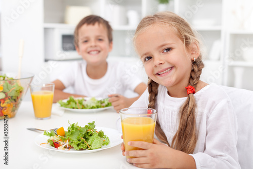 Photo: Kids eating a healthy meal Kids eating a healthy meal
